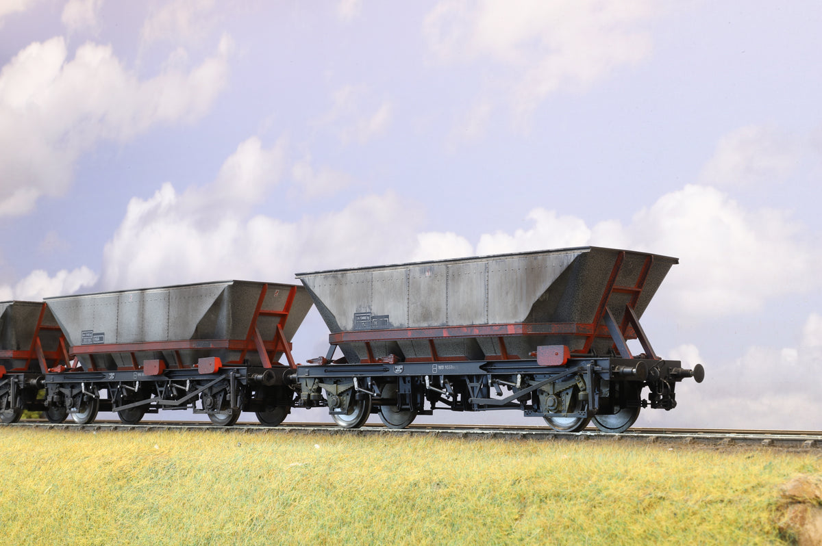 A rake of three Dapol 7F-048-011 O Gauge HAA Coal Wagons, Weathered