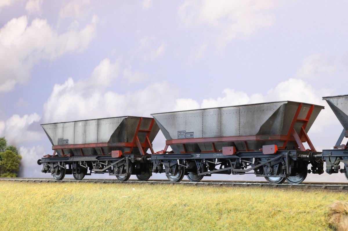 A rake of three Dapol 7F-048-011 O Gauge HAA Coal Wagons, Weathered